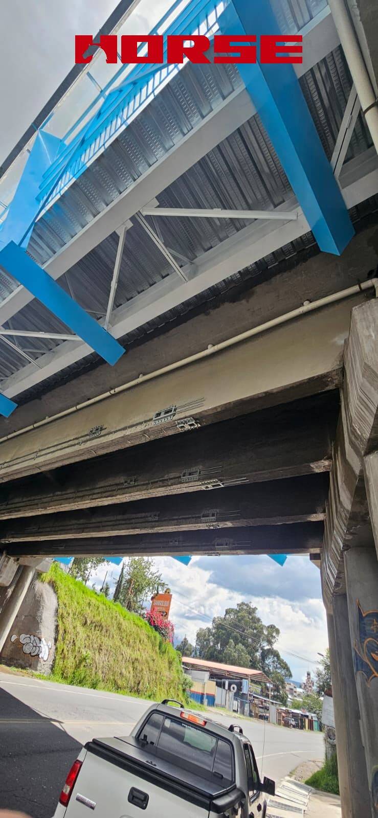 Strengthening a Critical Bridge in Ecuador by FRP Post-tension System