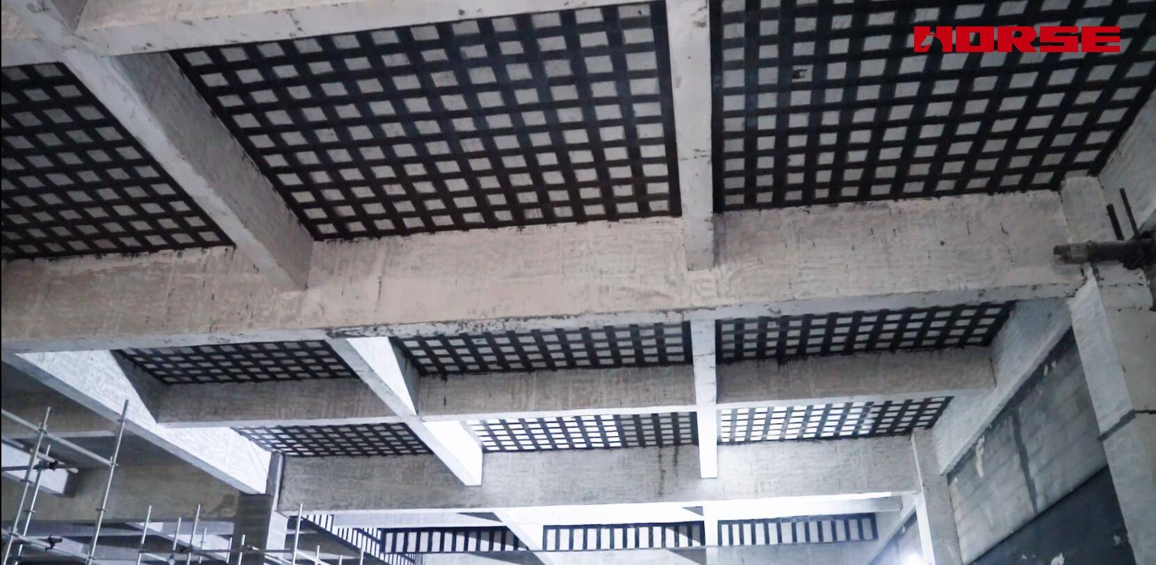 Post-Fire Structural Restoration with CFRP Reinforcement Post-Fire Structural Restoration with CFRP Reinforcement