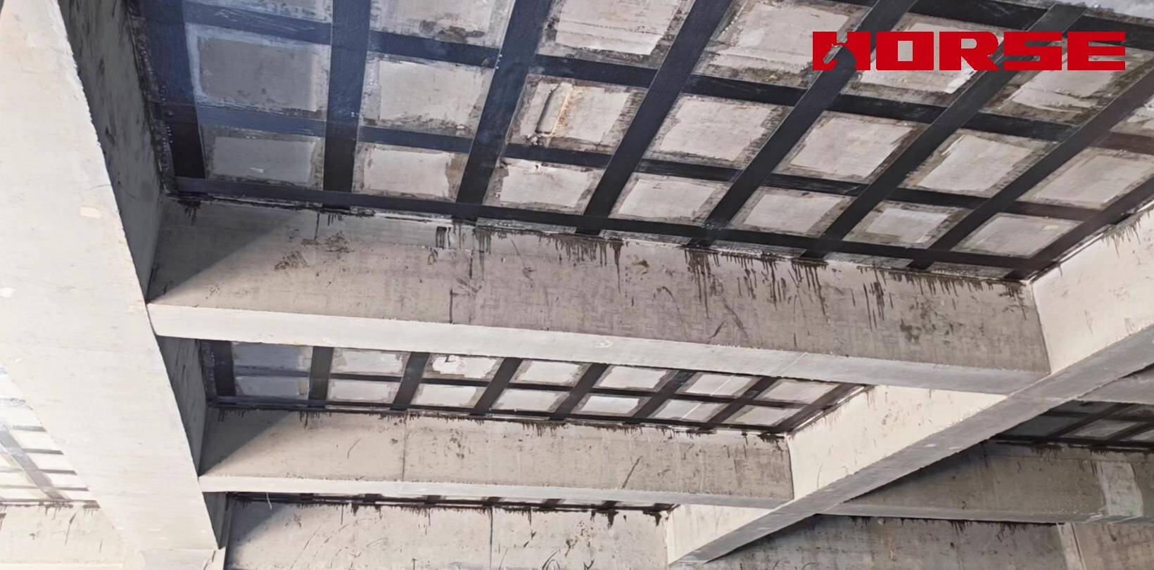 Improve the Load Capacity of Concrete Slab by FRP Composte Strengthening