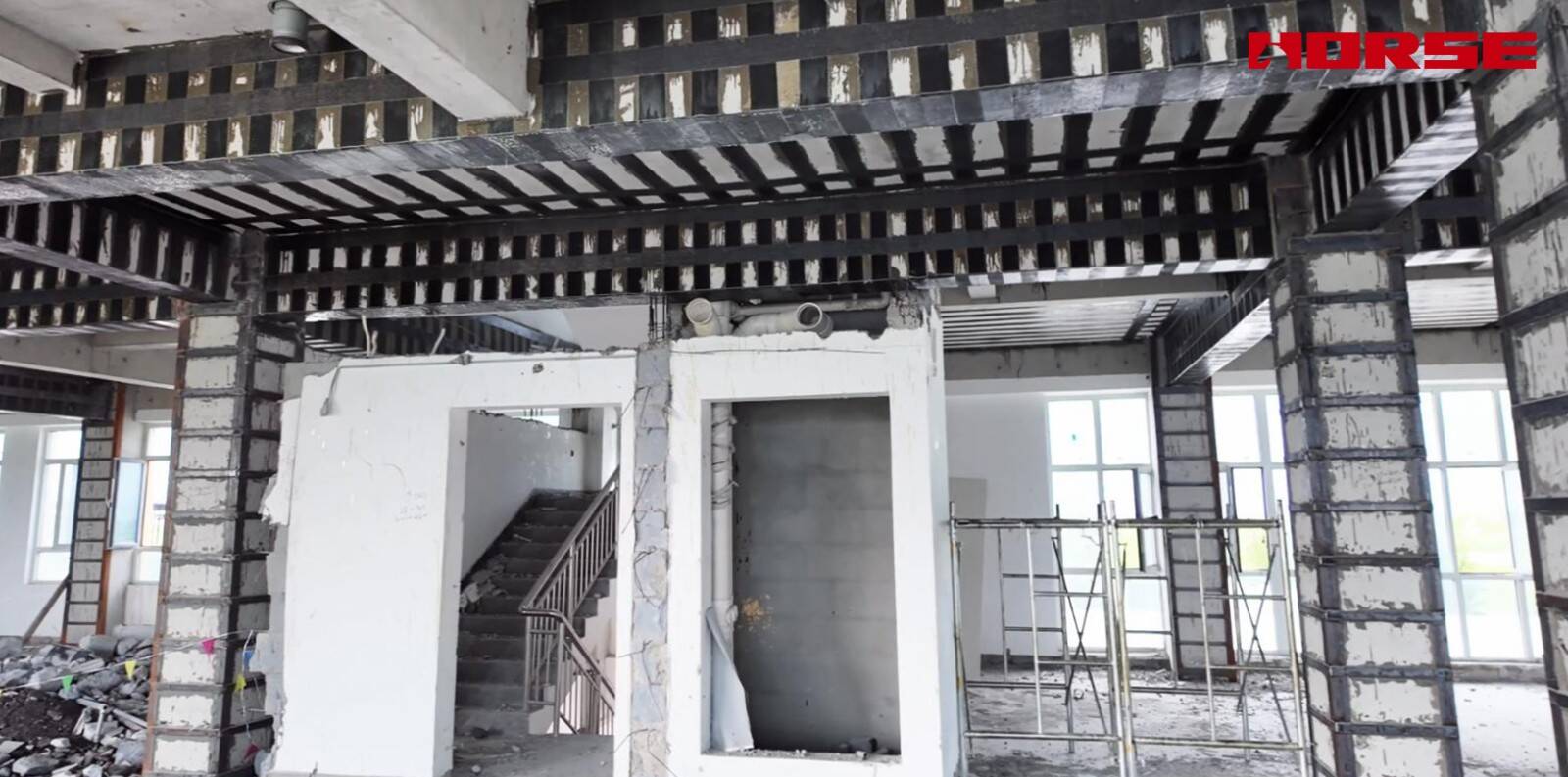 Structural Retrofit for Commercial-to-Senior-Care Conversion -- Carbon Fiber & Steel Jacketing